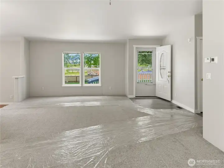 Looking toward the front door, from the pellet stove area Looking toward the front door, from the pellet stove area