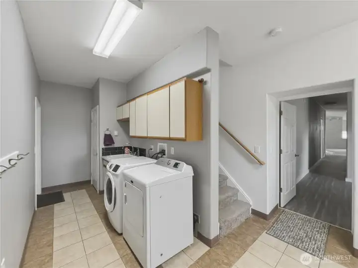 Garage door is to the left, right doorway is to the flex space and main living areas. Garage door is to the left, right doorway is to the flex space and main living areas.