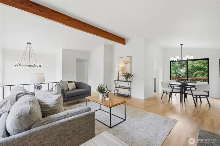 The open floor plan connects the living, dining, and kitchen areas in a natural circular flow.