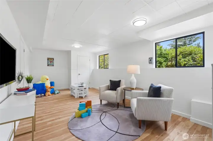 The flex space on the lower level can be another bedroom, office, playroom, or workout space. Endless possibilities.