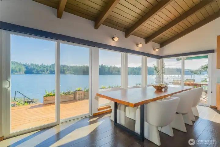 Imagine gathering at this table for special occasions or even just dinner for two.  The views are magical!  Right outside is plenty of outdoor entertaining space with a space for cooking and even a fire pit and outdoor kitchen space to cook up today's catch.
