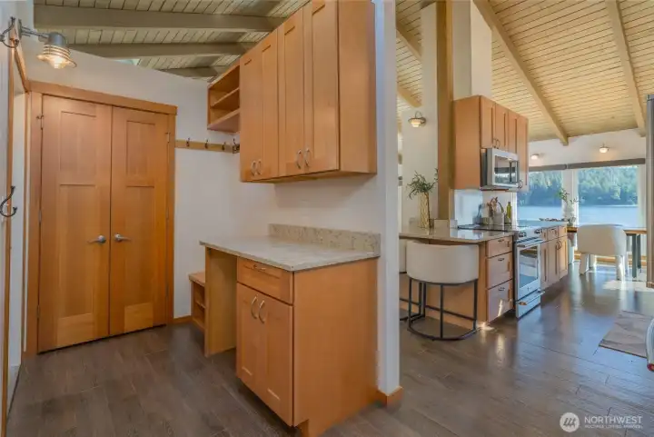 And, the butler's pantry is right off the kitchen that has another sink & laundry and abundant storage space.  Off this room is an enclosed patio perfect for your pups and garden herbs....