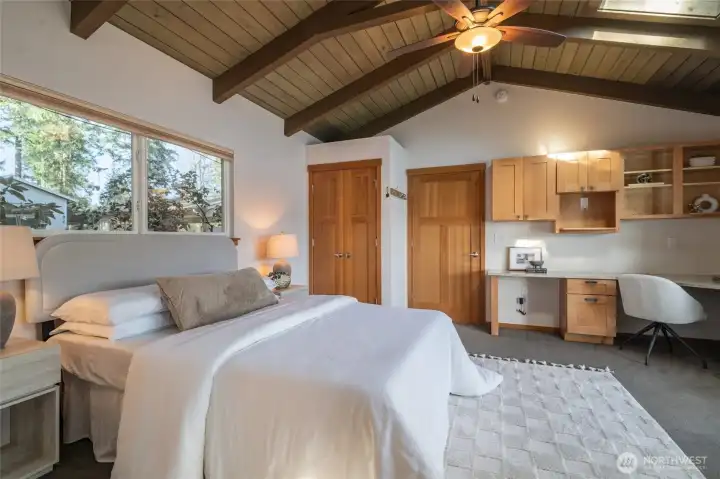 The first primary suite is luxe with beautiful natural light and has an office cubby space.