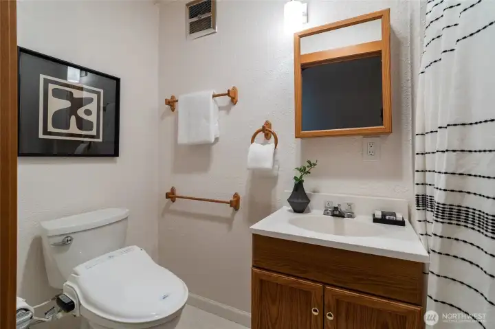 Off the den in the main home there is a  3/4 bath. Too many photos to post!