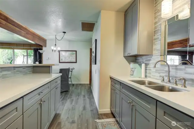 Second kitchen, downstairs. This space could be perfect for multi-generational living or....rent!