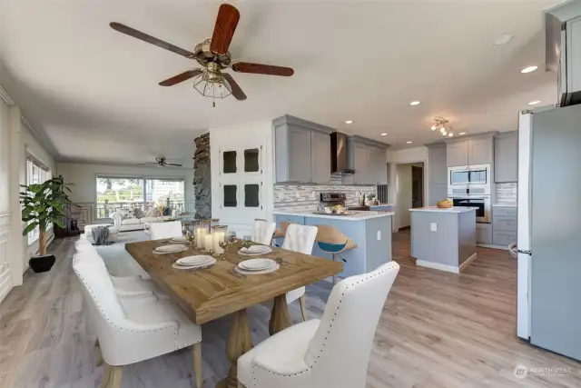 Virtually staged, lovely dining room open to gorgeous updated kitchen.