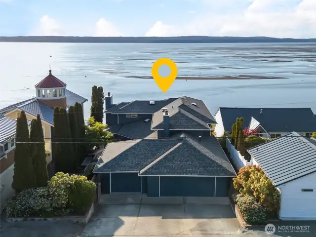 Front aerial view of private warm beach