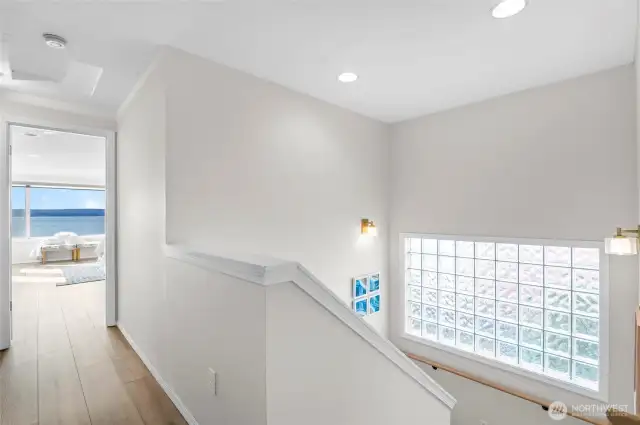 Light stairwell with glass block window to all upper bedrooms