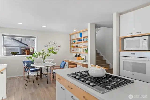 Chefs kitchen with breakfast nook area and garden window box.