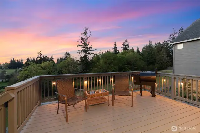 Fire up the grill and enjoy sunset dinners on the spacious back deck—an ideal setup for entertaining friends and family.