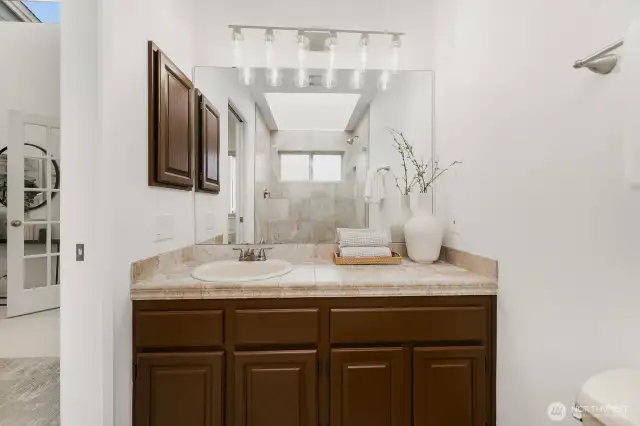 Primary ensuite bath with walk-in shower