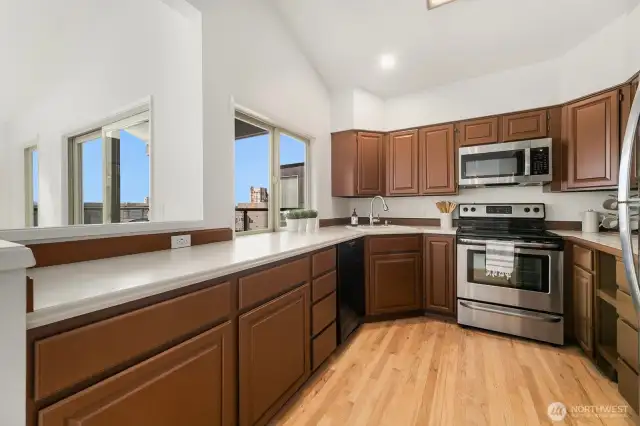 Freshly painted cabinetry and refinished REAL hardwood floors.