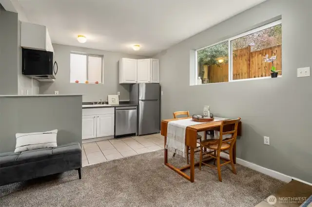 Open flow between dining area and kitchen.