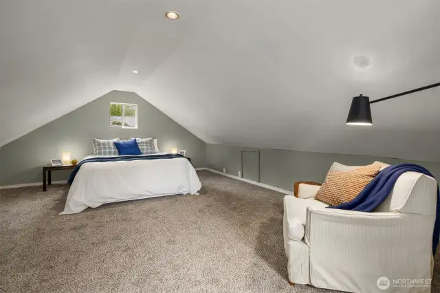 Upstairs half-story bedroom or flex space adding versatility.
