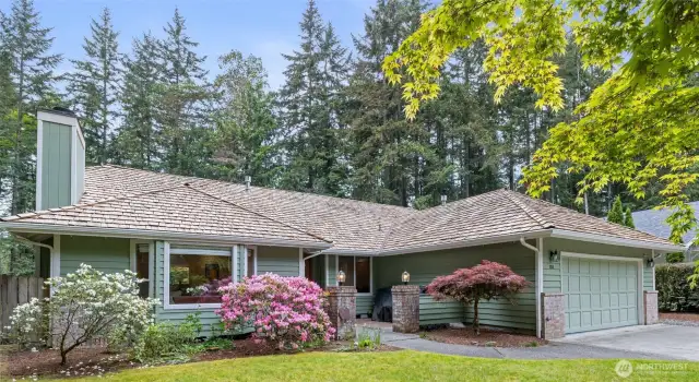 A beautiful rambler situated in a park like setting is ready for you to call home.