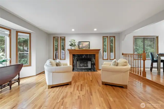 Fantastic windows and hardwood floors give a clean, bright look to the living room.