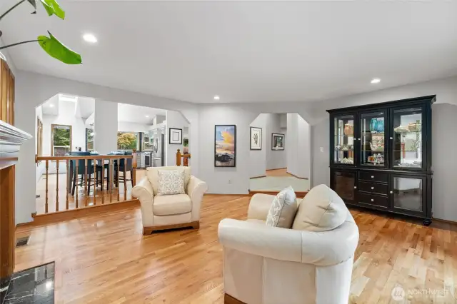 The entry way is ahead to the right. To the left is the dining room & kitchen.