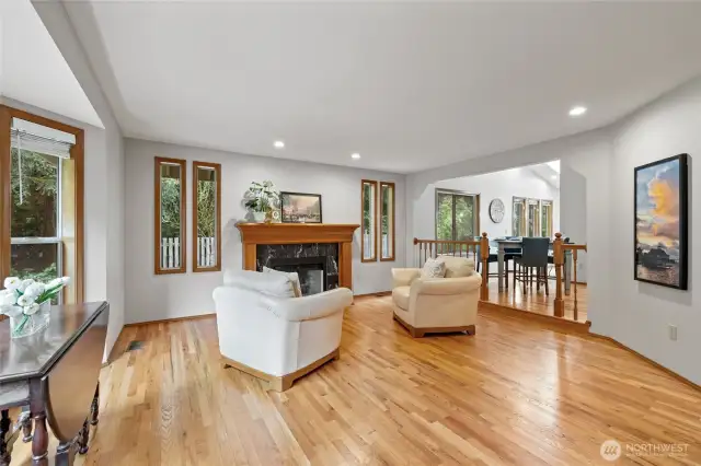 Enjoy cozy evenings by the fireplace in the living room.