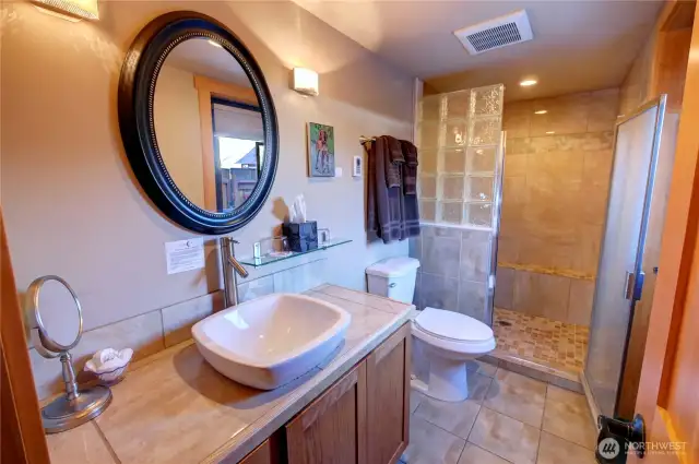 Unit 2 bathroom has a shower instead of a bathtub.