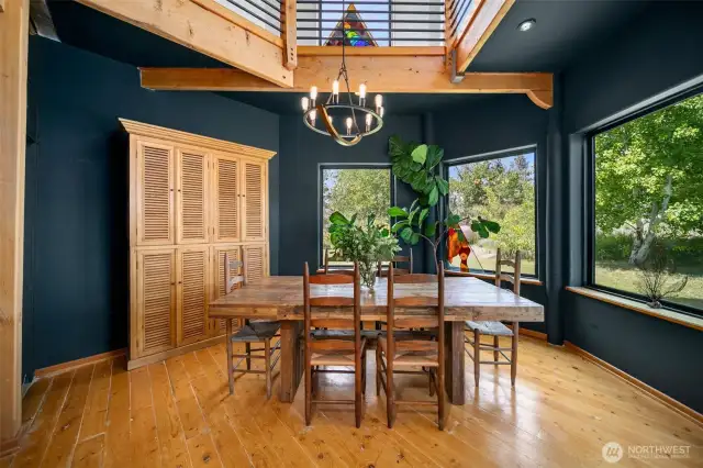 Moody dining area with tons of natural light.