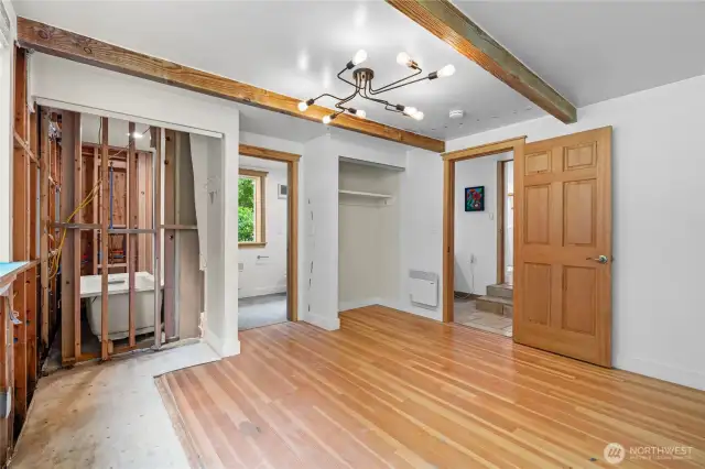 Unfinished room with bathroom (functioning) off of breezway by the kitchen