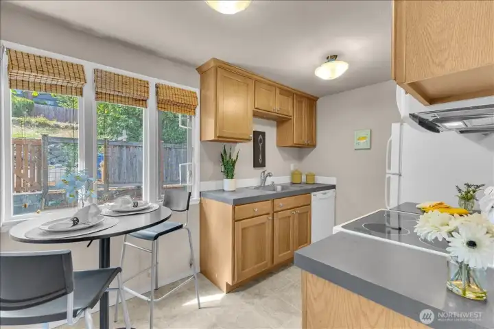 Kitchen with eating space by the windows