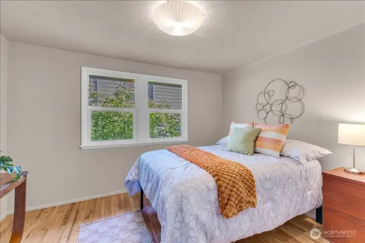 Primary bedroom on the main floor with walk-in closet