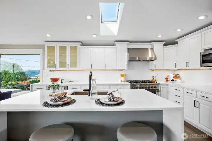 Skylights let in even more light to your updated, chef's kitchen.