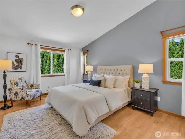 Primary bedroom is an oasis of space, light and calm