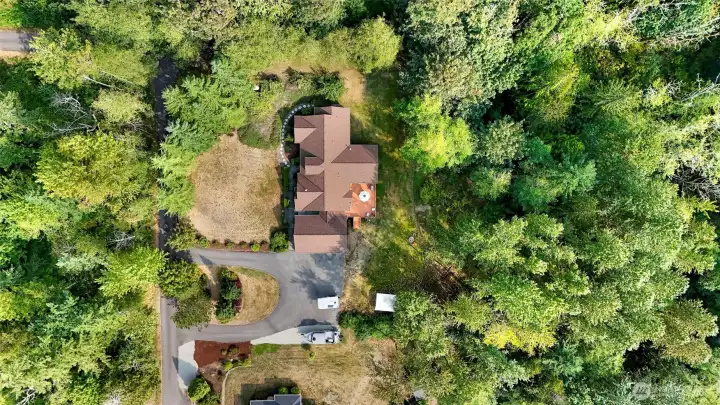 Surrounded by serene forestry land on one side and just two neighbors on the other, this home offers privacy and tranquility on a quiet dead-end street