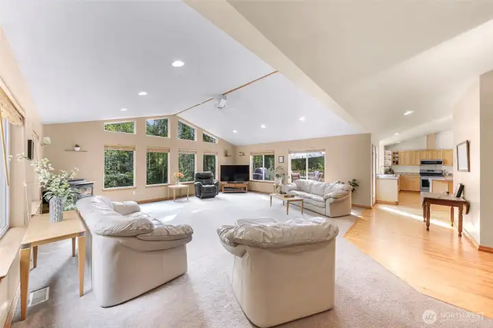 Great room open to kitchen and entry.