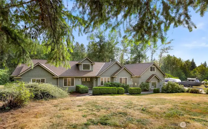 One level home offers open floor plan, detached 3 car garage with enclosed breezeway.