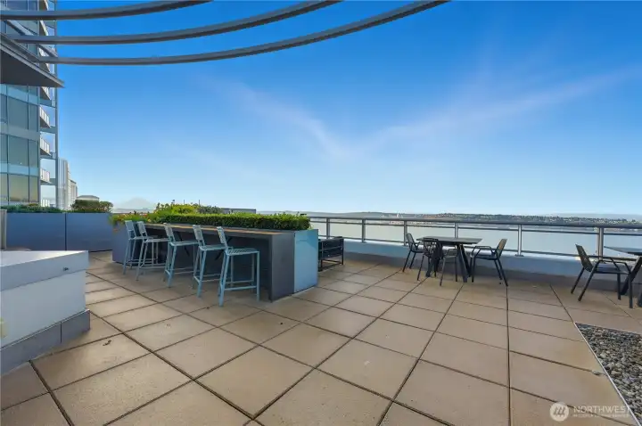 Imagine enjoying a drunk on the rooftop deck at sunset!