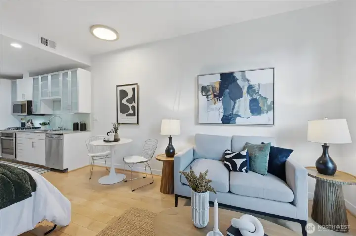 Main living area of this fabulous studio style home with space to enjoy living & dining area for entertaining!