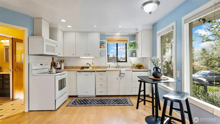 You’ll love the kitchen upgrades - from the overhead microwave to the full-size dishwasher, everything’s been thoughtfully added for modern convenience. And yes, all the appliances stay!