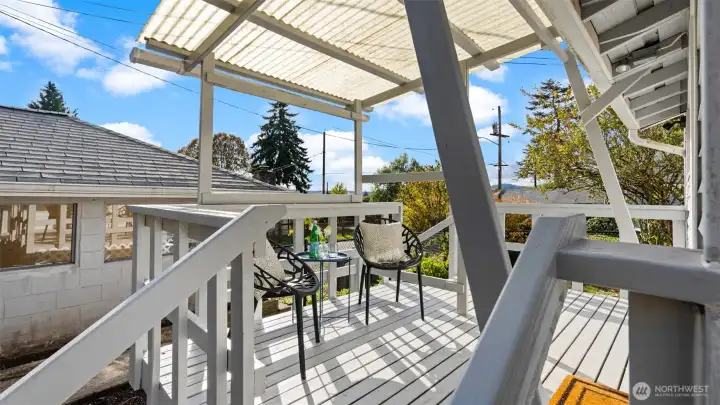 This covered porch was once partially enclosed along two sides, and it could easily be enclosed again if you’d like a bit more shelter or privacy. The setup makes future customization simple!