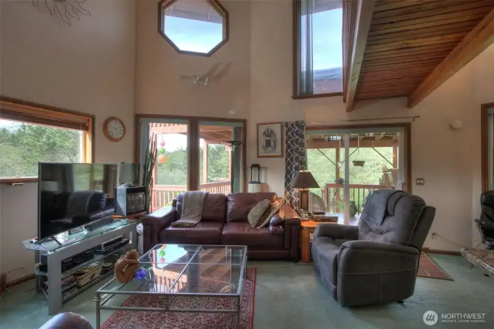 Living room lots of natural light, from the deck you have an unobstructed view of the wildlife in Conner Creek