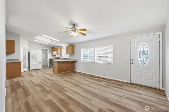 Skylights and vaulted ceilings make the space open, bright, and inviting.