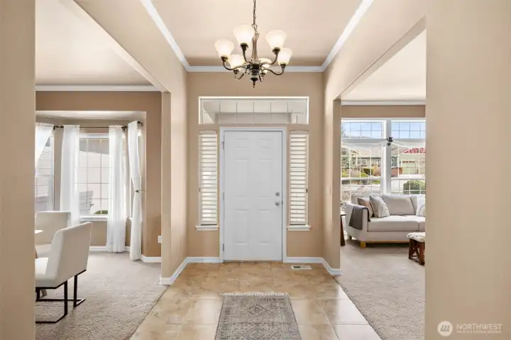 Front entry with access to formal dining and den/formal living