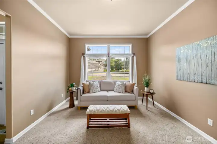 Beautiful formal dining room with views of the well kept neighborhood.