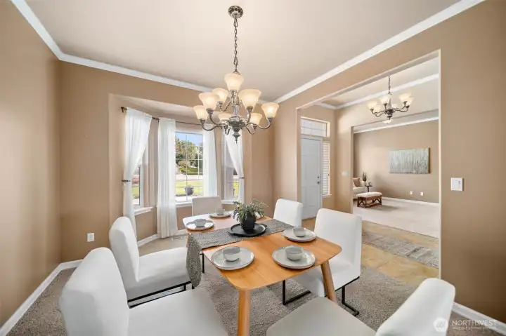Multiple entryways to the formal dining room.