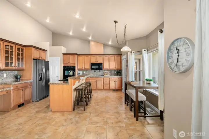Updated kitchen with bar and additional entertaining space!
