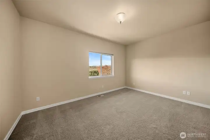 Bonus room or office space near the primary suite to give you one whole end of the home for yourself!