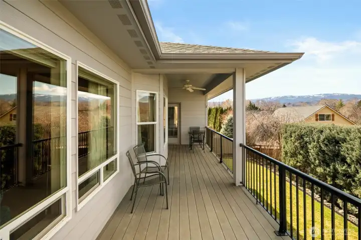 This well maintained back patio is accessible from the kitchen, primary bedroom, or the backyard!