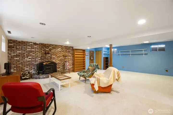 basement family room with fireplace