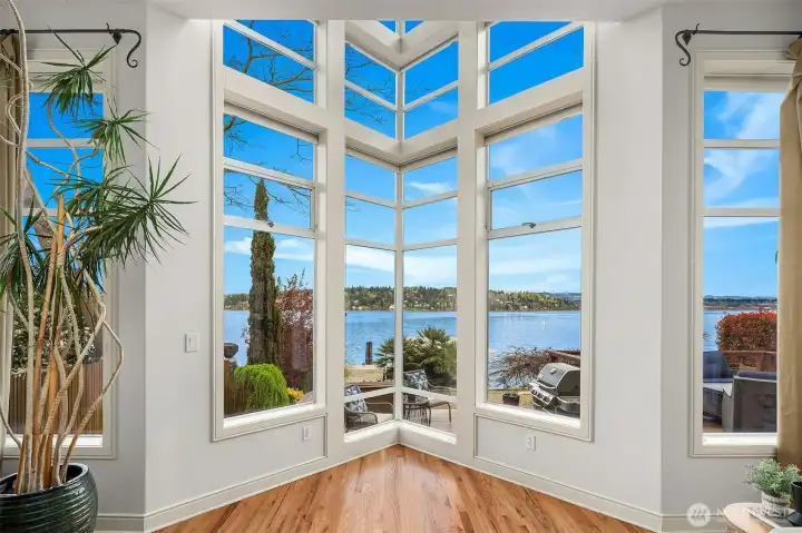 Floor-to-ceiling windows showcasing stunning lake views