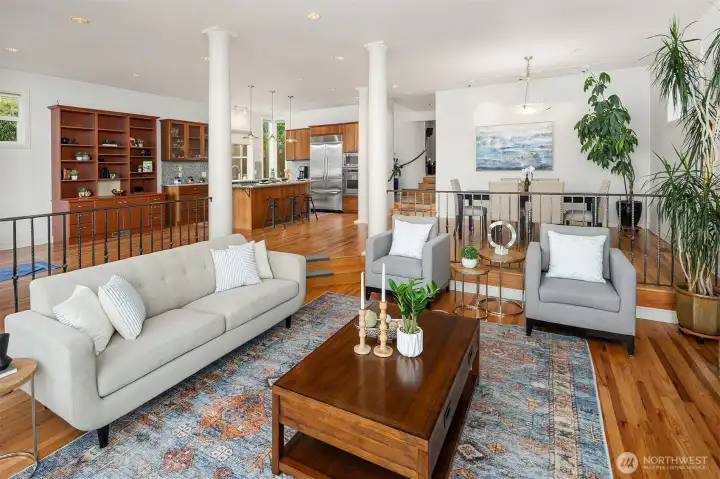 Sophisticated open-plan layout combining living, dining, and kitchen spaces with stunning lake views