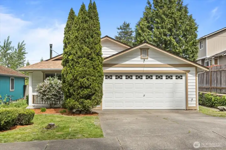 Spacious driveway and attached garage