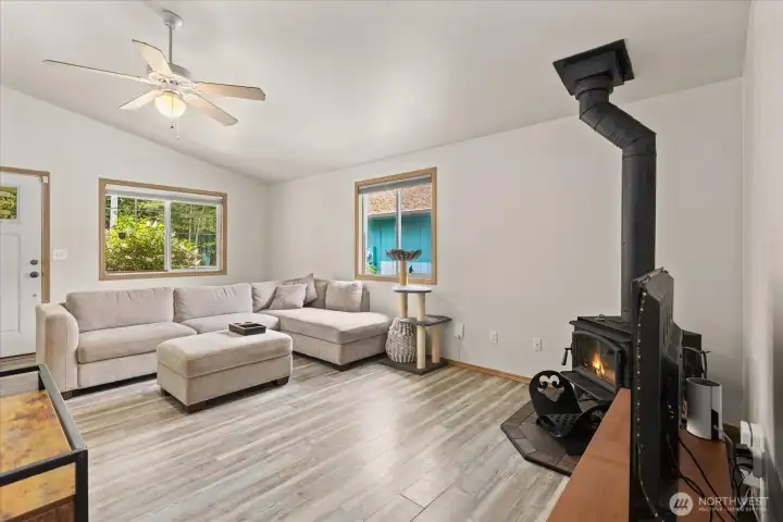 Alternate view of living room showcasing natural light