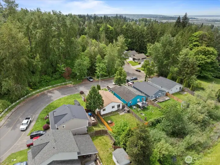 Aerial view showcasing the home’s position within the neighborhood